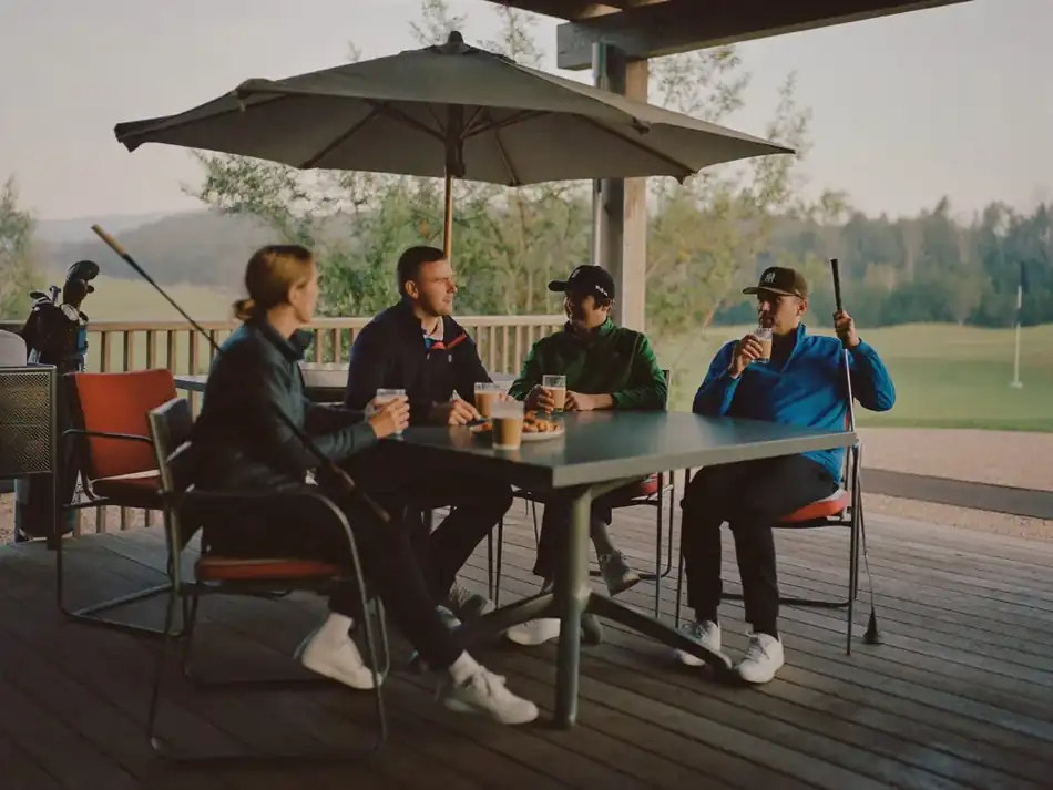 Golfers catching up after a round