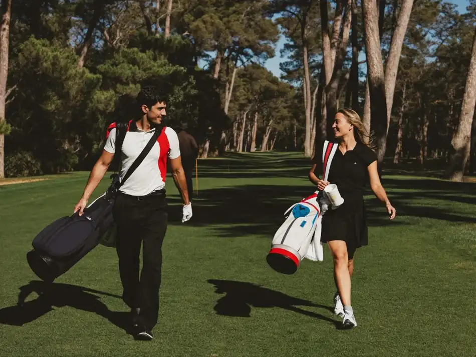 Two golfers enjoying a conversation on the fairway
